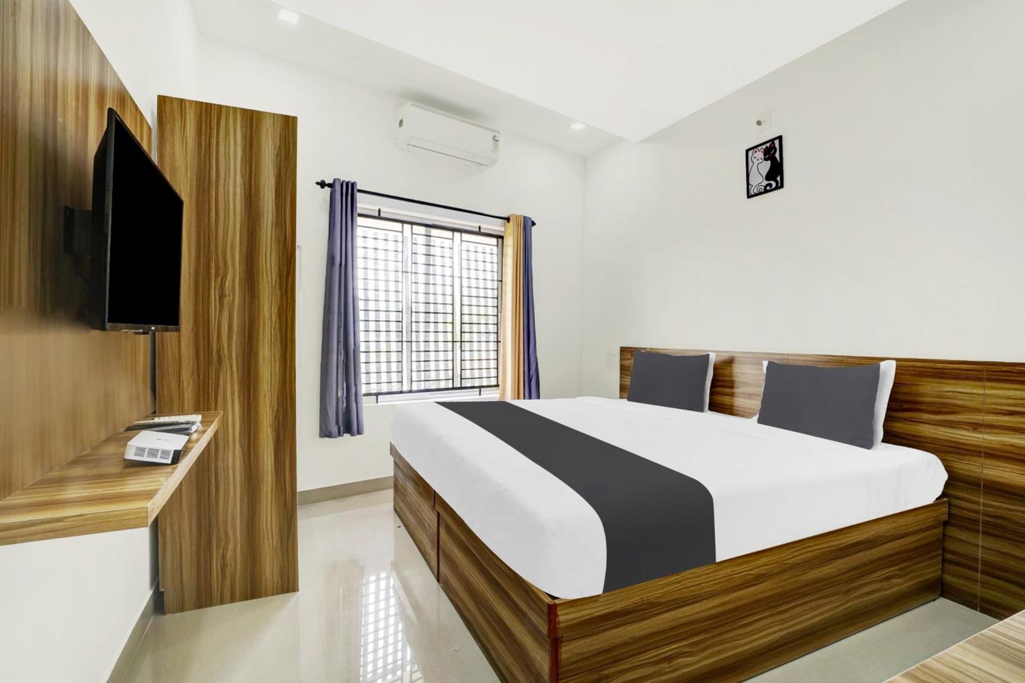 Hotel O Grand Parassini Pappinisseri Екстер'єр фото