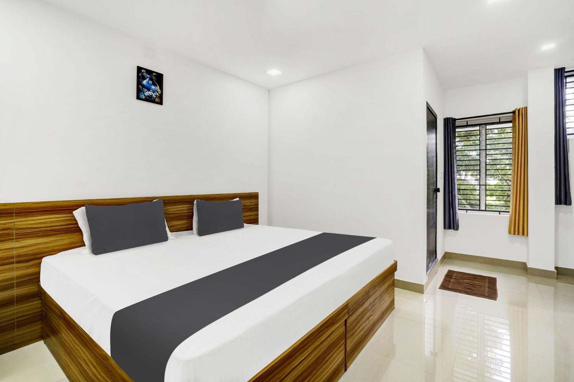 Hotel O Grand Parassini Pappinisseri Екстер'єр фото
