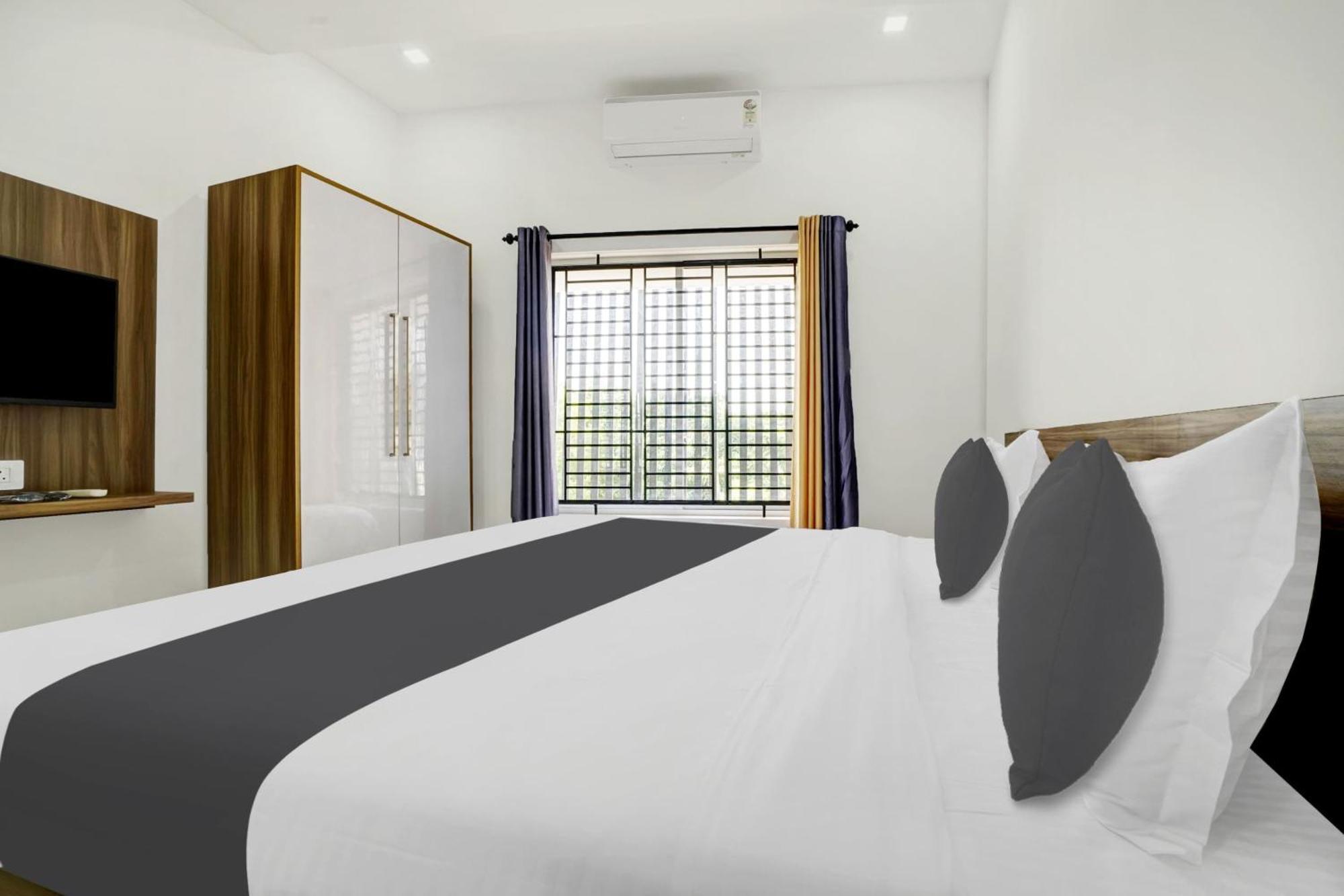 Hotel O Grand Parassini Pappinisseri Екстер'єр фото