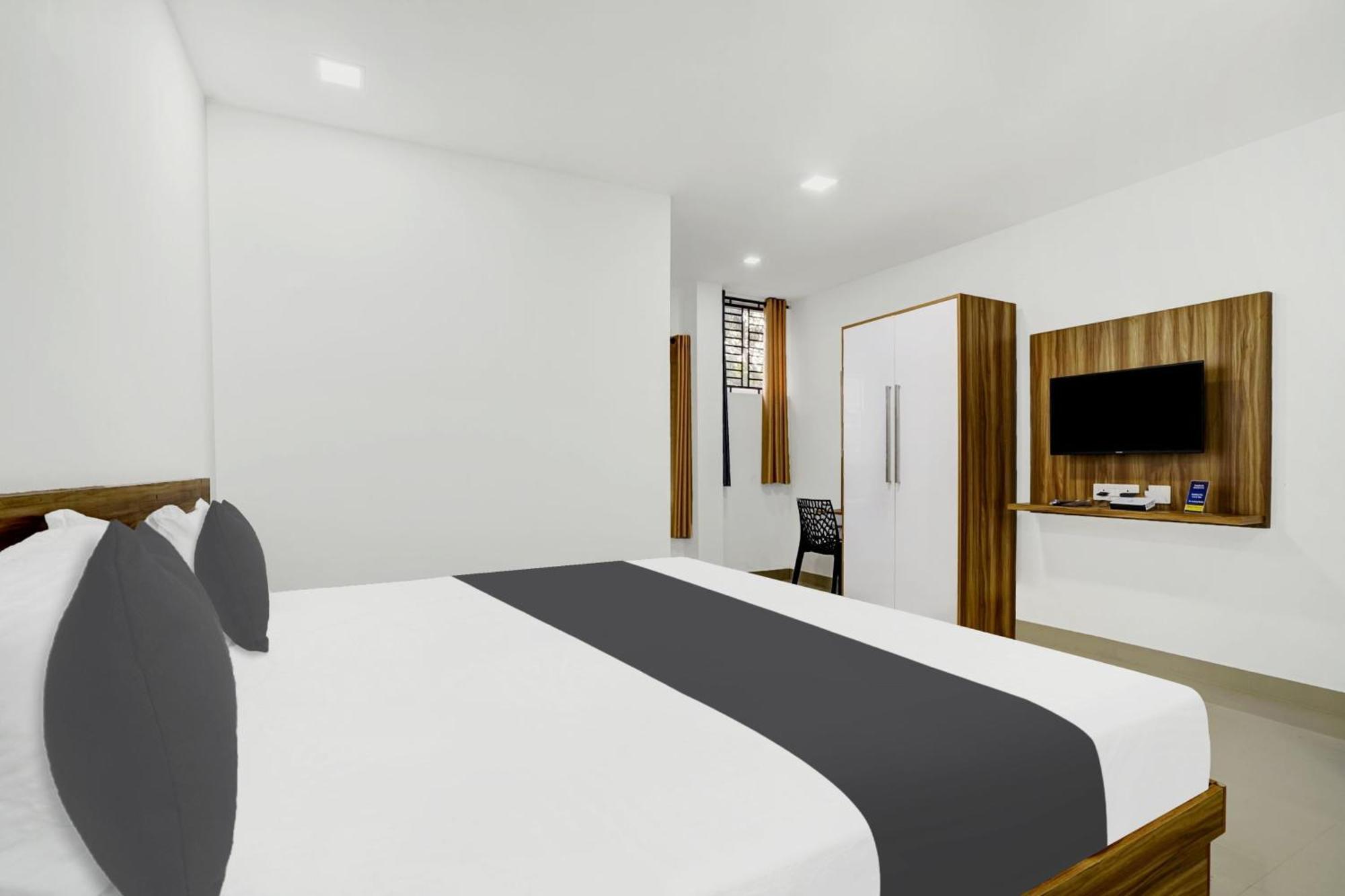 Hotel O Grand Parassini Pappinisseri Екстер'єр фото